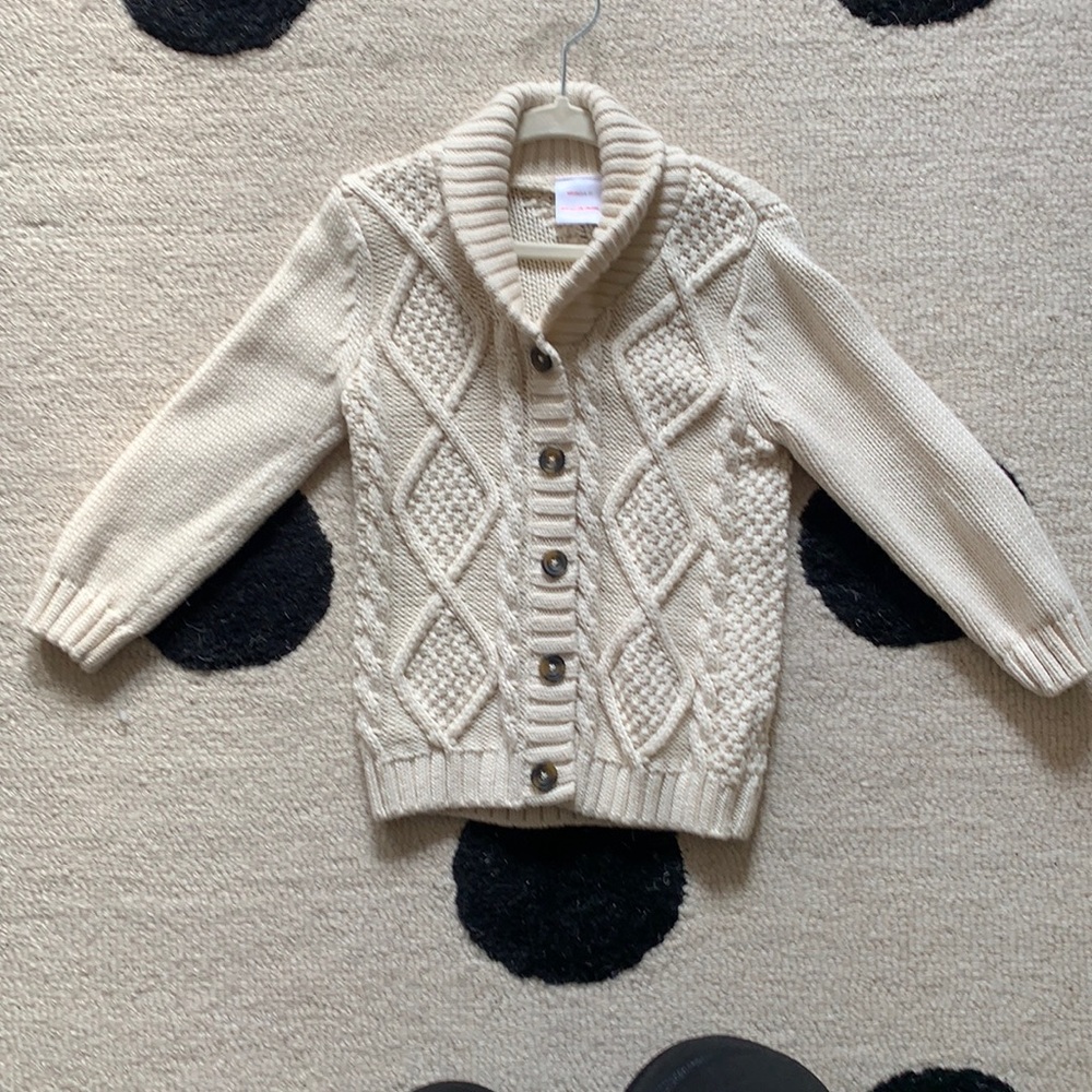 Hannah Andersson chunky ivory sweater with faux suede elbow patches